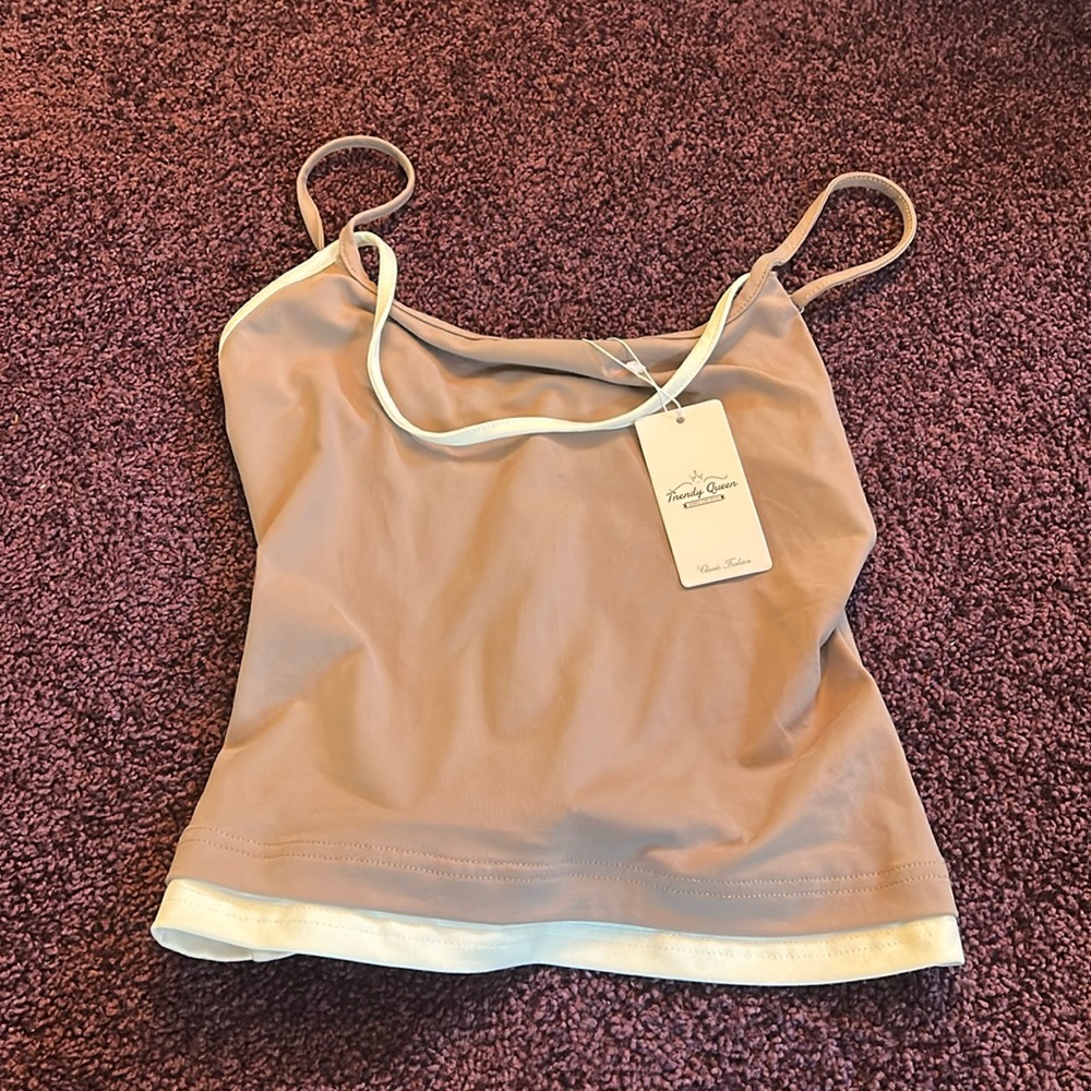 Brand new top bought on Amazon it’s too big now never worn